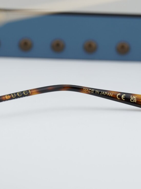Gucci GG1980S 001 Oval Sunglasses - Transparent Dark Grey/Gold main image 4